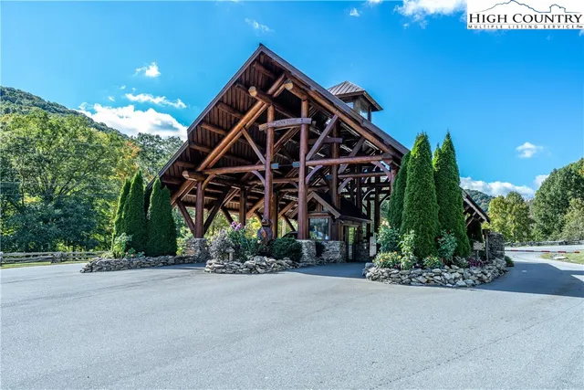 a view of a lush green space with sea