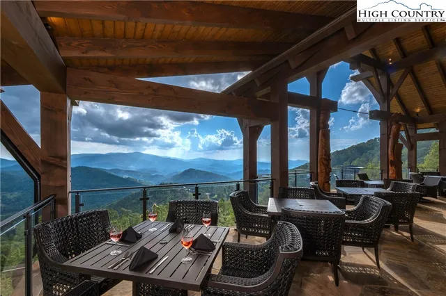 a view of balcony with furniture