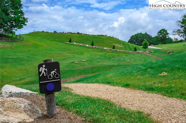 a sign on the side of the road