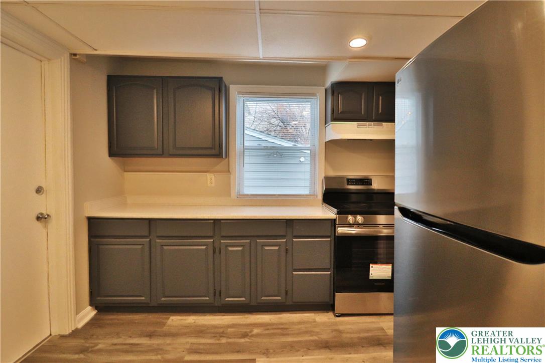 28 West Raspberry Street, Unit 2 Bethlehem, PA 18018 - Photo 6 of 13 a kitchen with a sink and cabinets