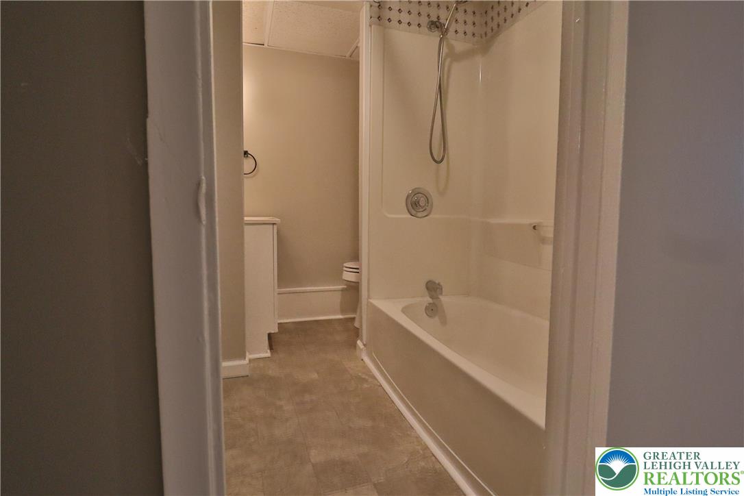 28 West Raspberry Street, Unit 2 Bethlehem, PA 18018 - Photo 8 of 13 a bathroom with a tub and shower