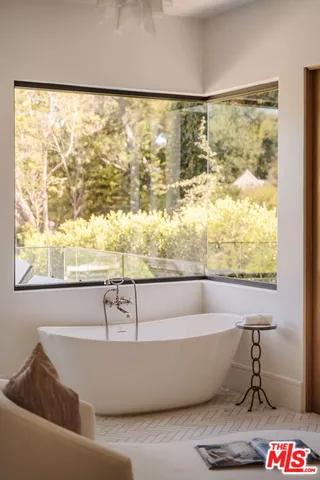 a view of a bathtub in a balcony
