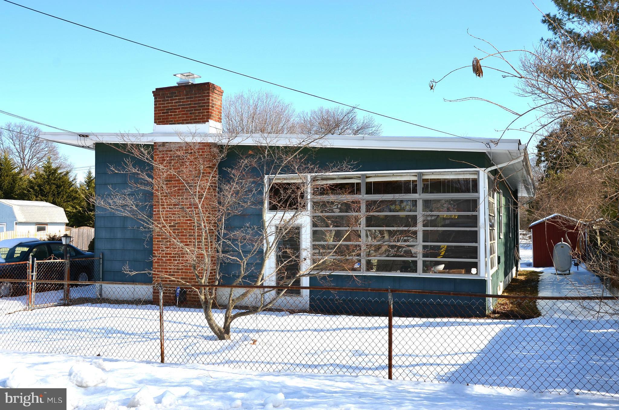 1637 Hilltop Road Edgewater, MD 21037 - Photo 1 of 20 a building outdoor space with parking in front of it