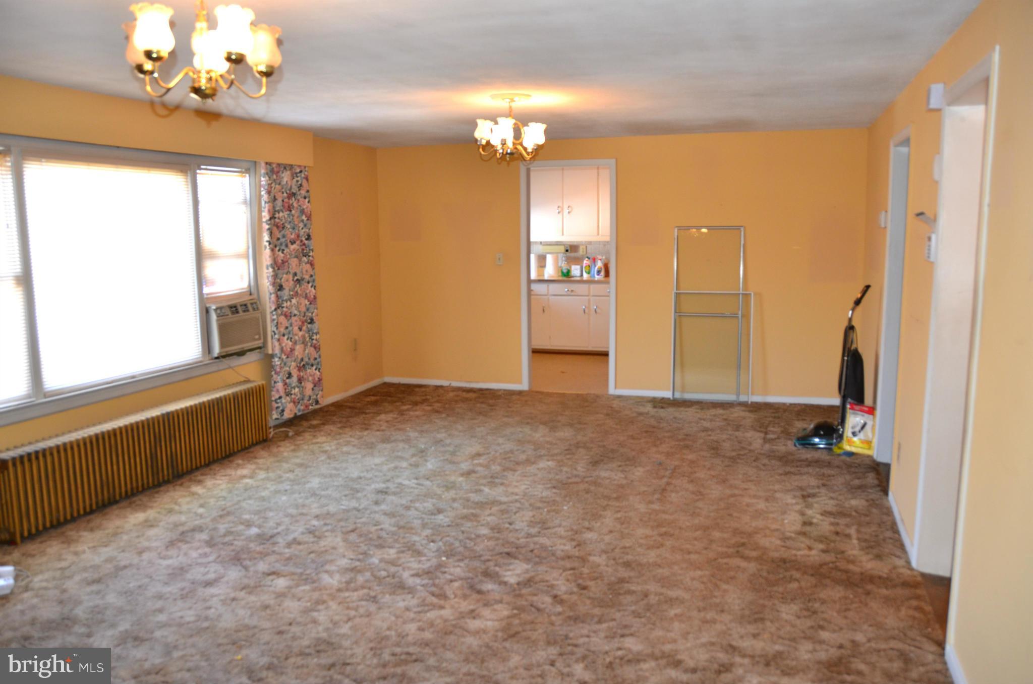 1637 Hilltop Road Edgewater, MD 21037 - Photo 12 of 20 wooden floor in an empty room with a window