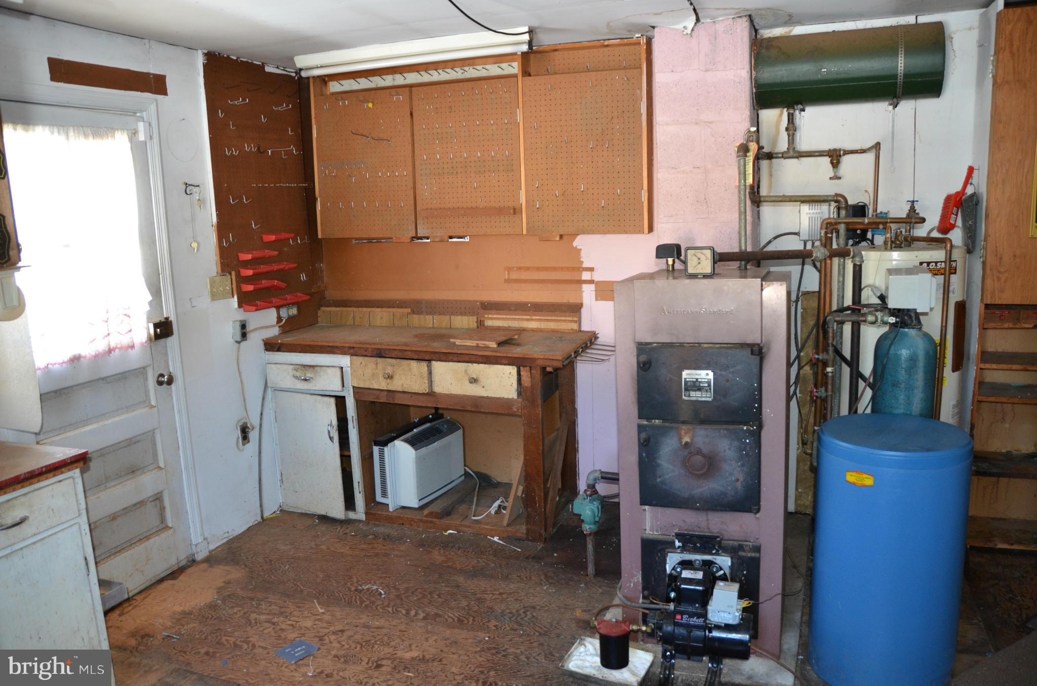 1637 Hilltop Road Edgewater, MD 21037 - Photo 14 of 20 a room with storage and utility