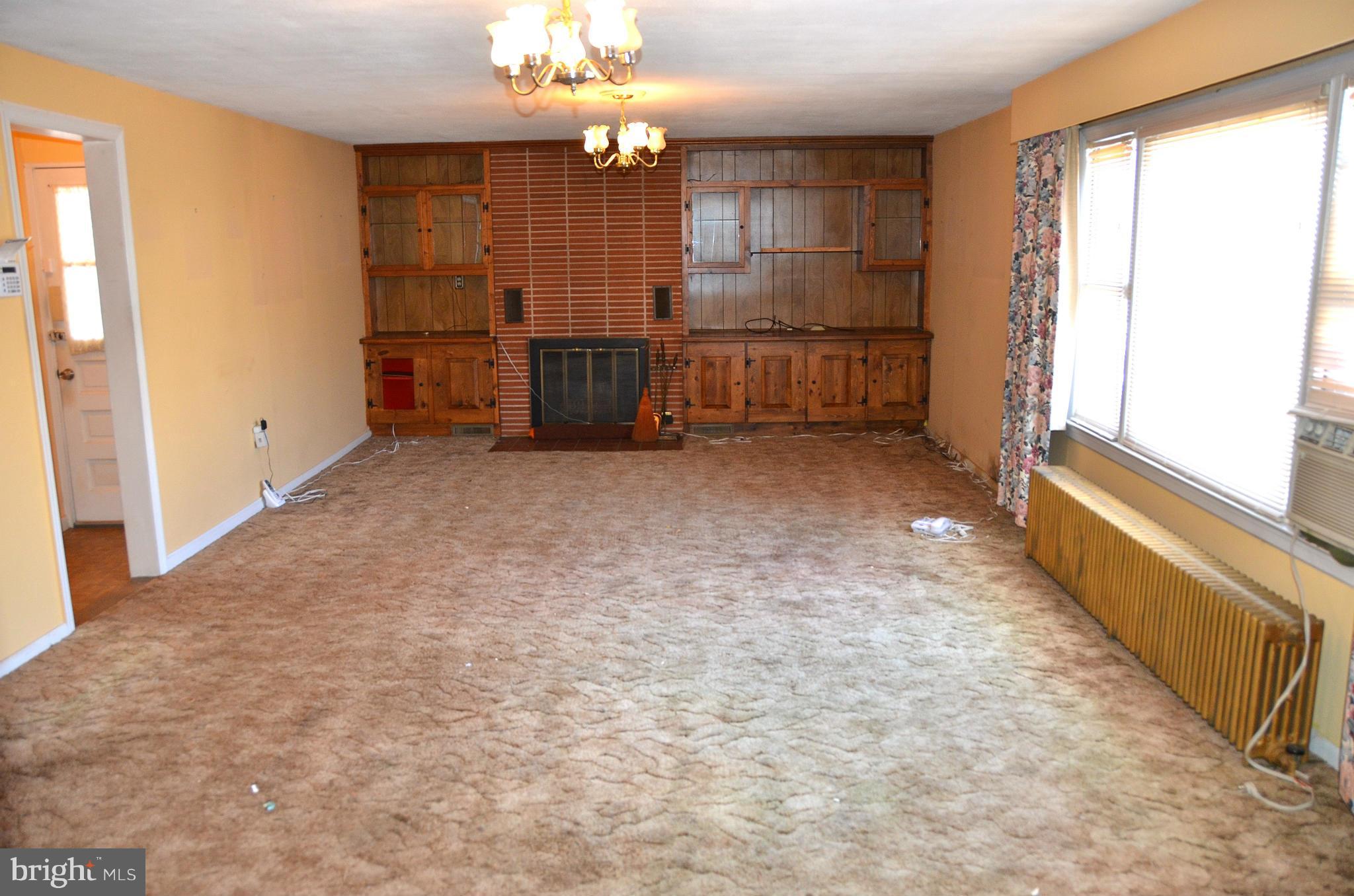 1637 Hilltop Road Edgewater, MD 21037 - Photo 5 of 20 wooden floor in an empty room with a window