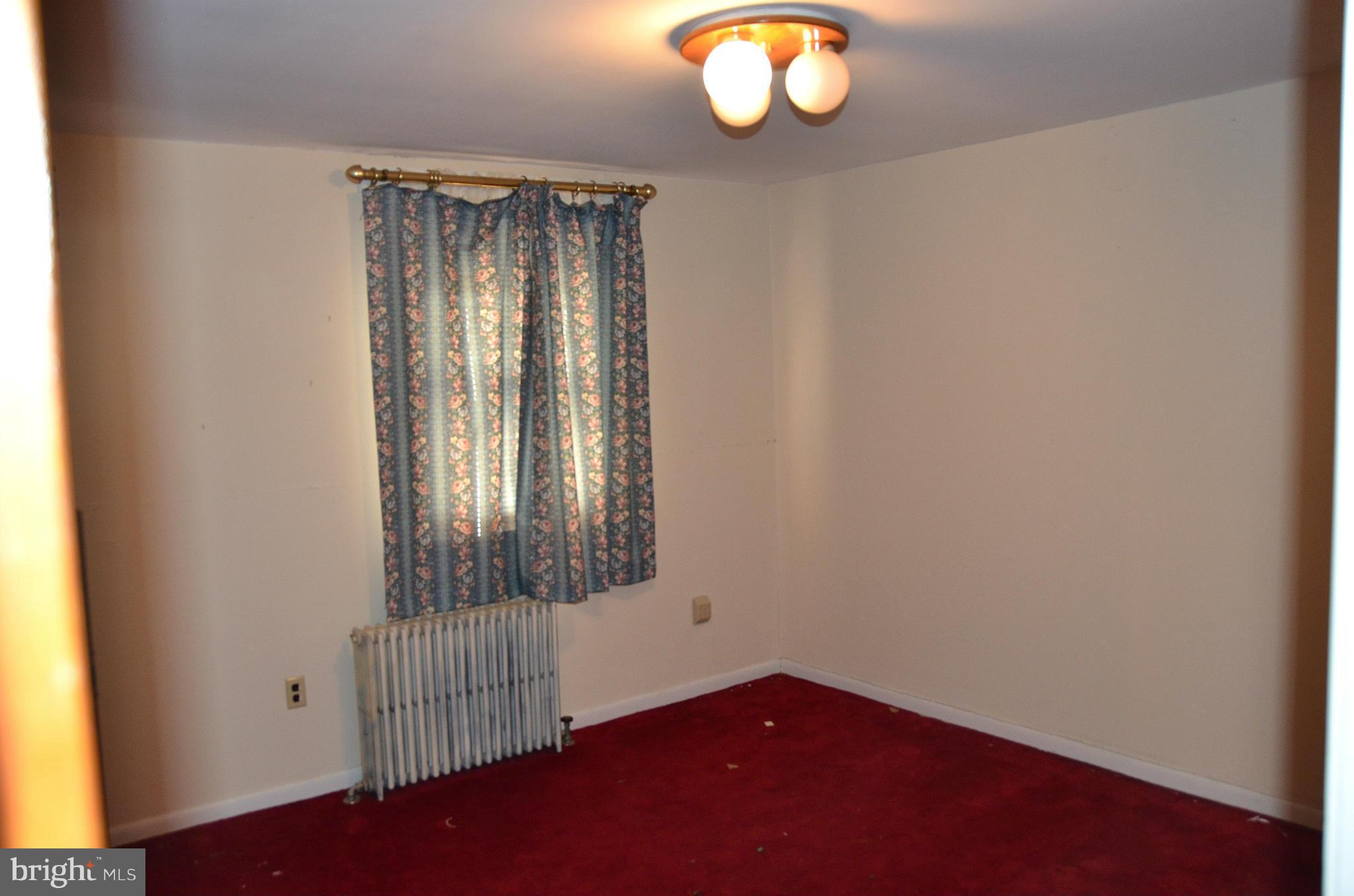 1637 Hilltop Road Edgewater, MD 21037 - Photo 7 of 20 an empty room with window