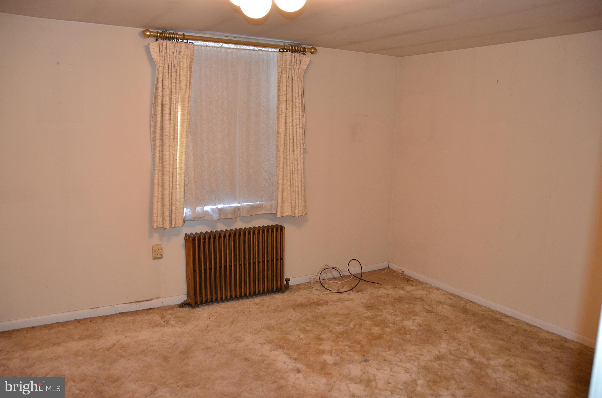 1637 Hilltop Road Edgewater, MD 21037 - Photo 10 of 20 a view of an empty room