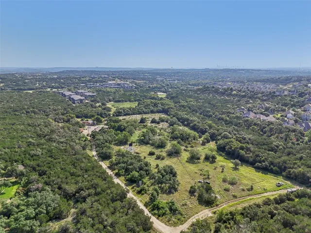 an aerial view of residential house and space