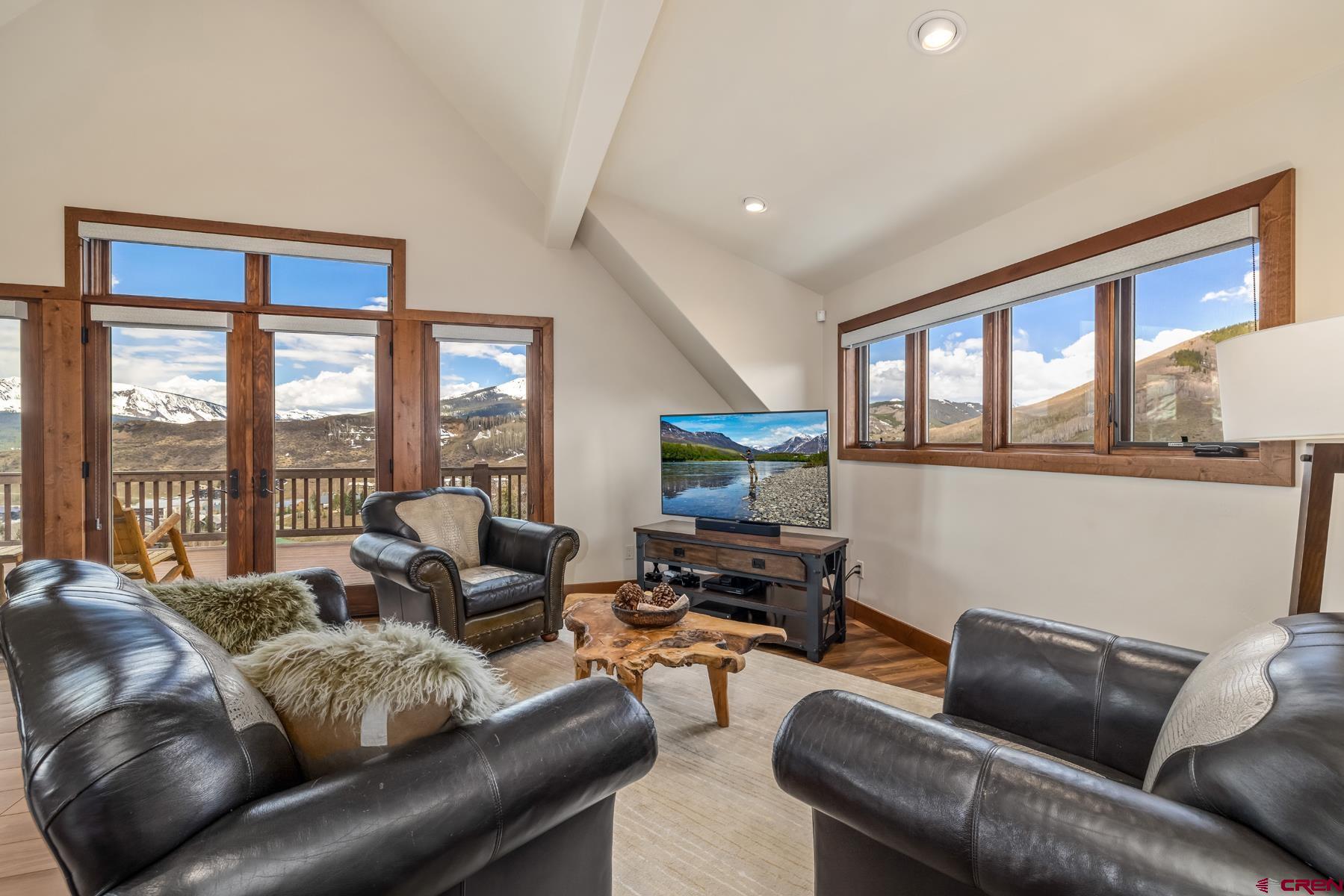 32 Cinnamon Mountain Road Crested Butte, CO 81225 - Photo 29 of 44 a living room with furniture and a large window