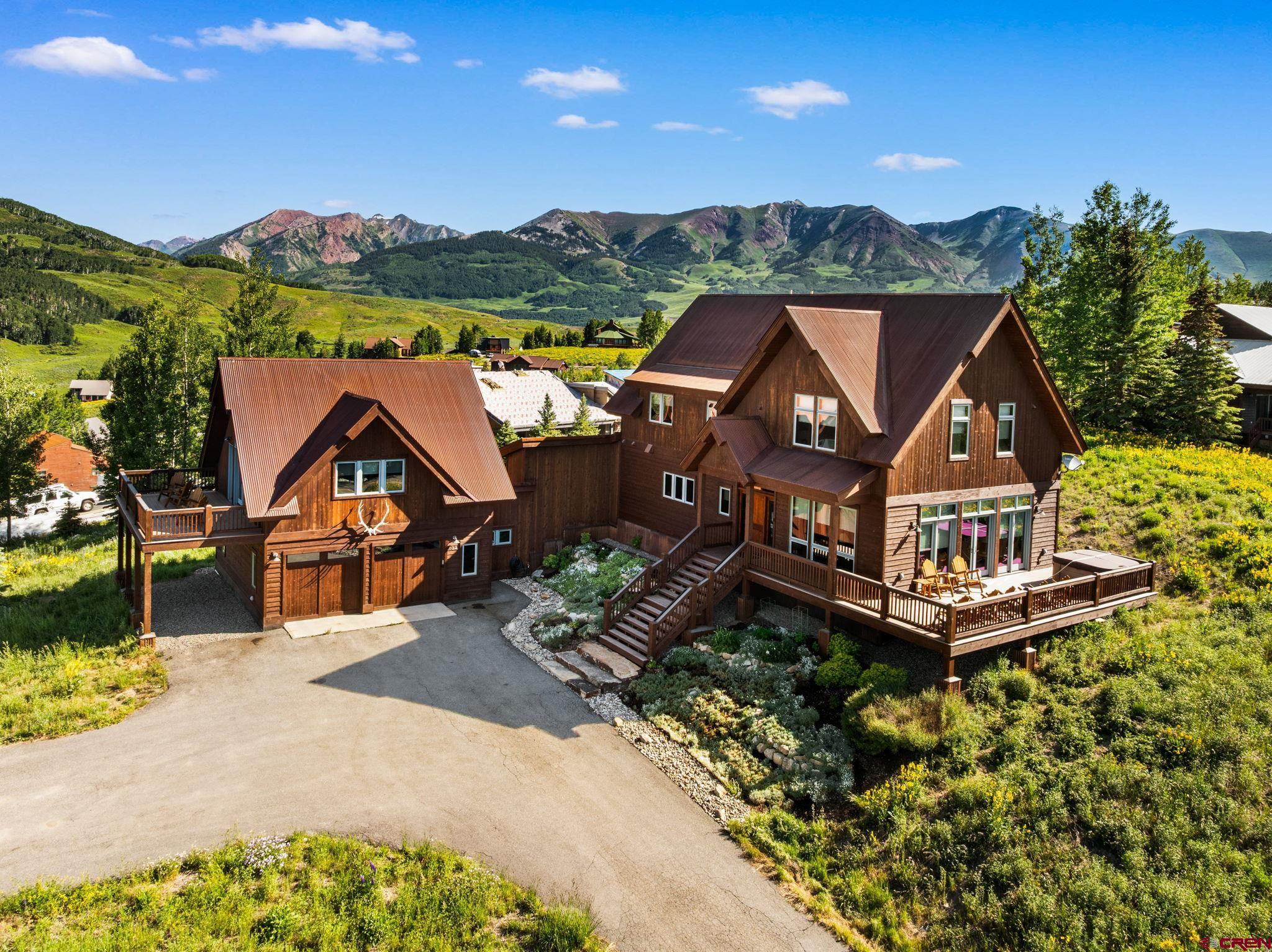 32 Cinnamon Mountain Road Crested Butte, CO 81225 - Photo 39 of 44 an aerial view of a house with a garden