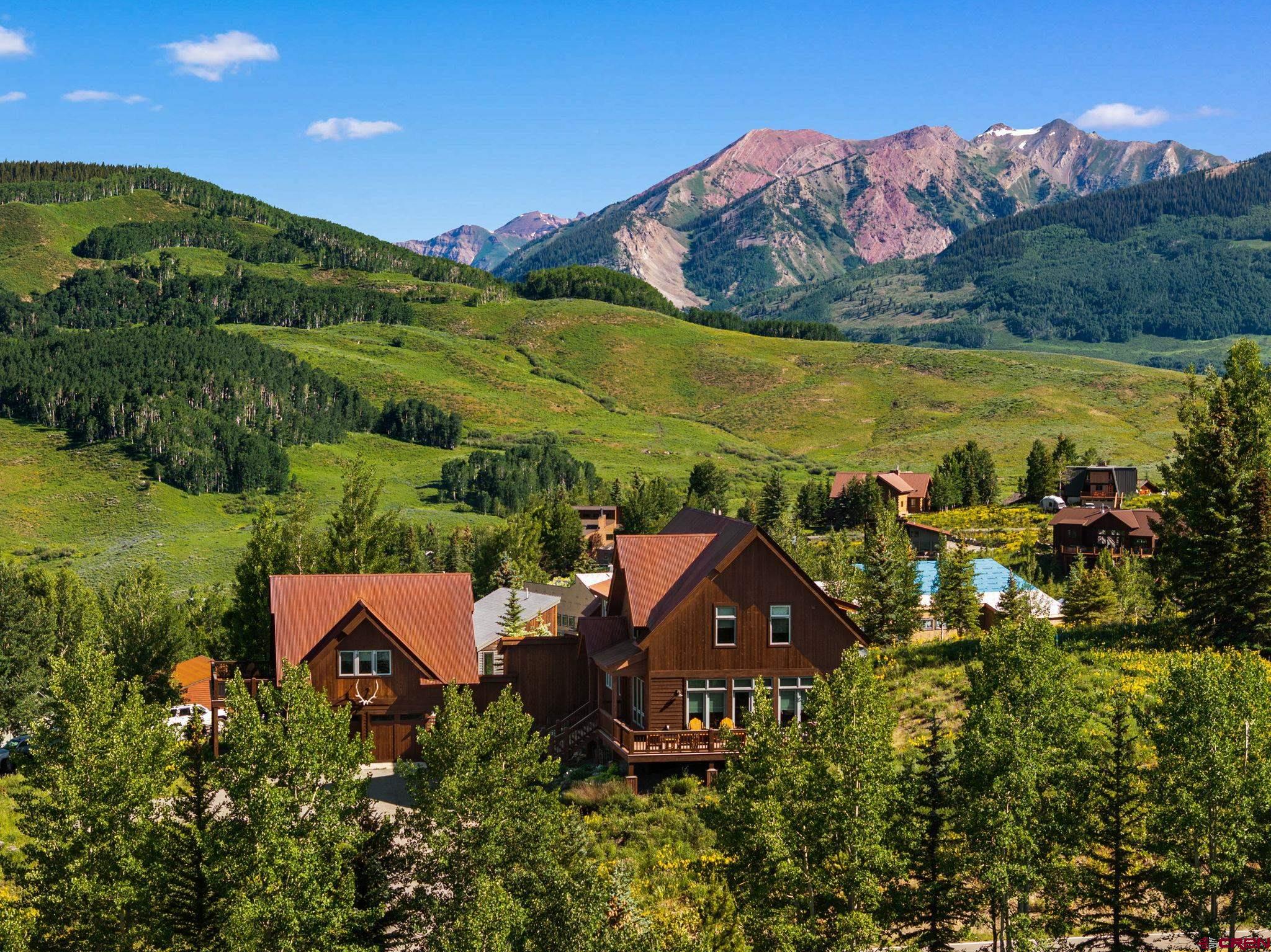 32 Cinnamon Mountain Road Crested Butte, CO 81225 - Photo 41 of 44 an aerial view of a house with a garden
