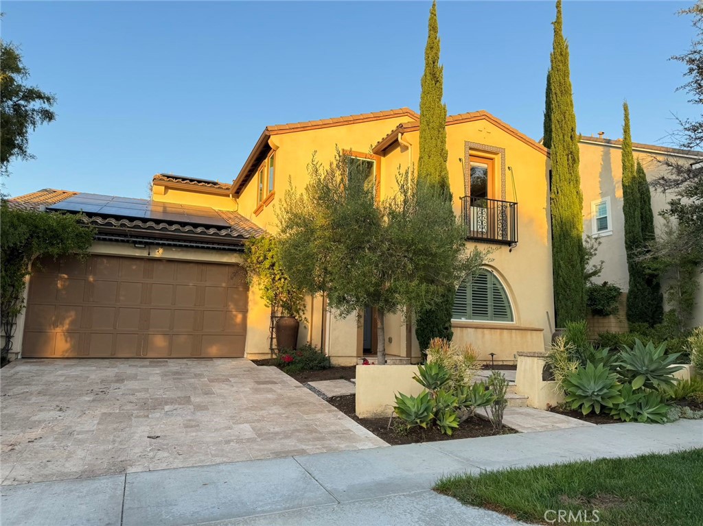 107 Cardinal Irvine, CA 92618 - Photo 1 of 1 a front view of a house with a yard and garage