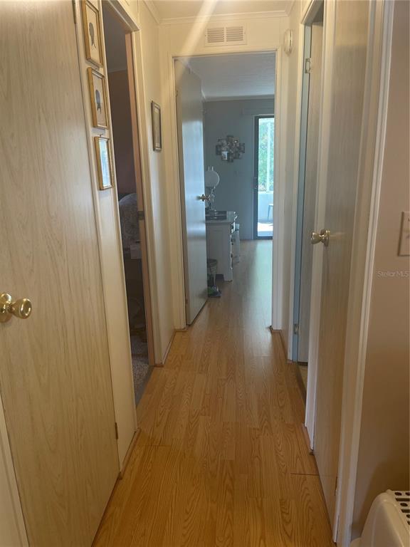 4179 Rolling Oaks Drive Winter Haven, FL 33880 - Photo 12 of 31 a view of a bathroom from a hallway