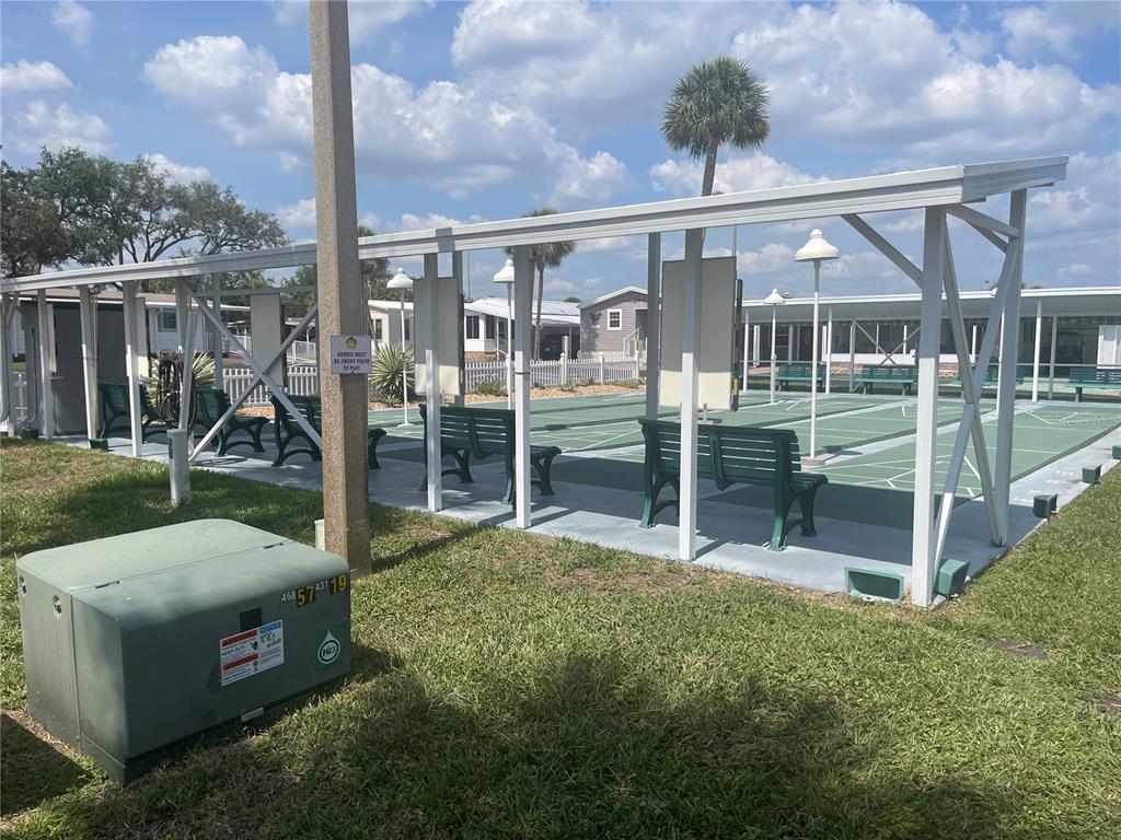 4179 Rolling Oaks Drive Winter Haven, FL 33880 - Photo 25 of 31 a view of a house with backyard and porch