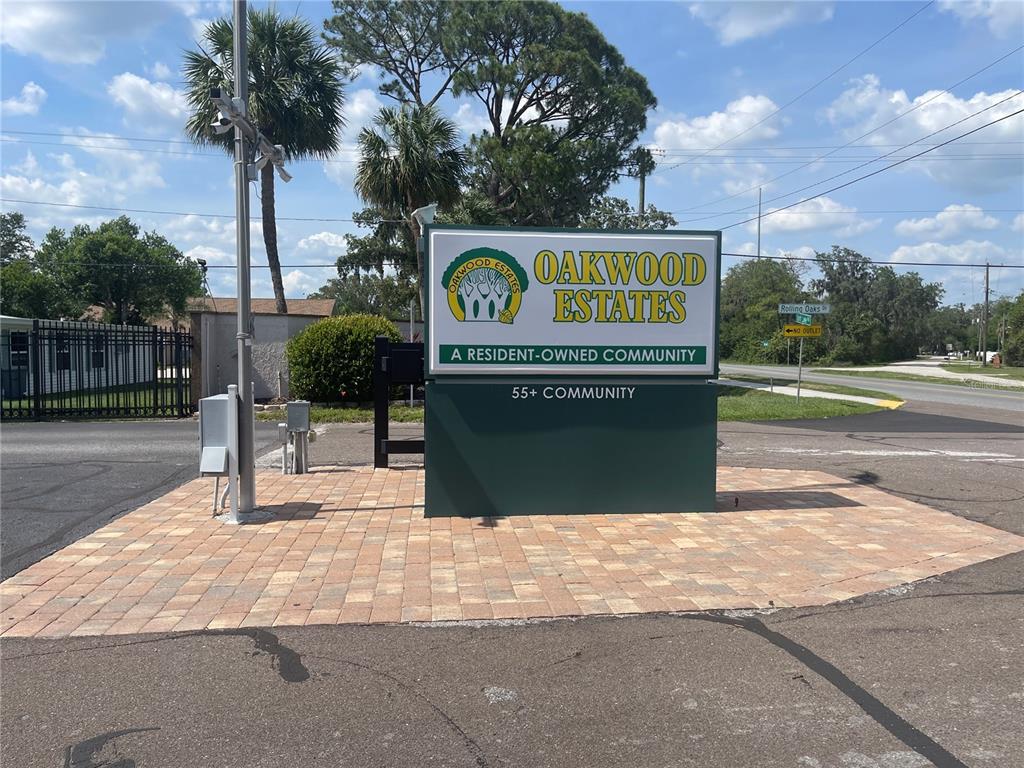 4179 Rolling Oaks Drive Winter Haven, FL 33880 - Photo 26 of 31 a sign on a pole on a street