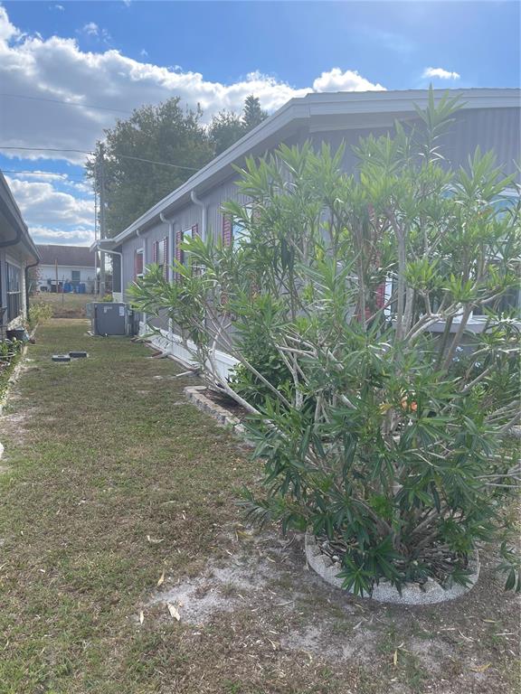 4179 Rolling Oaks Drive Winter Haven, FL 33880 - Photo 8 of 31 a view of a garden with a plants