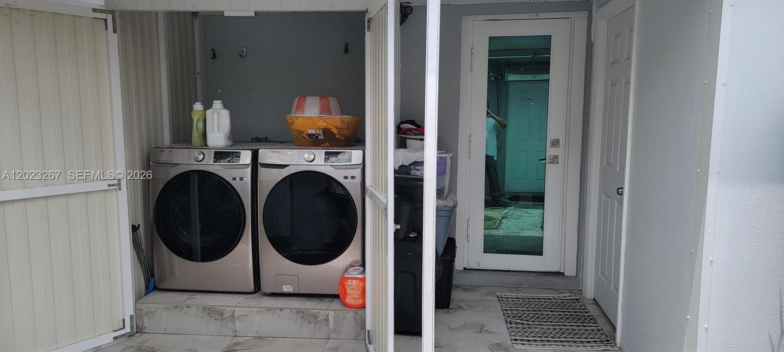 301 Southwest 36th Avenue Miami, FL 33135 - Photo 15 of 32 a storage room with washer and dryer