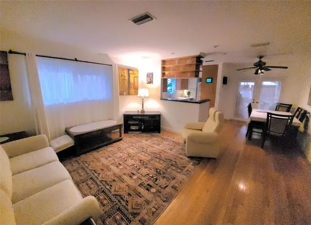 a living room with furniture and a couch