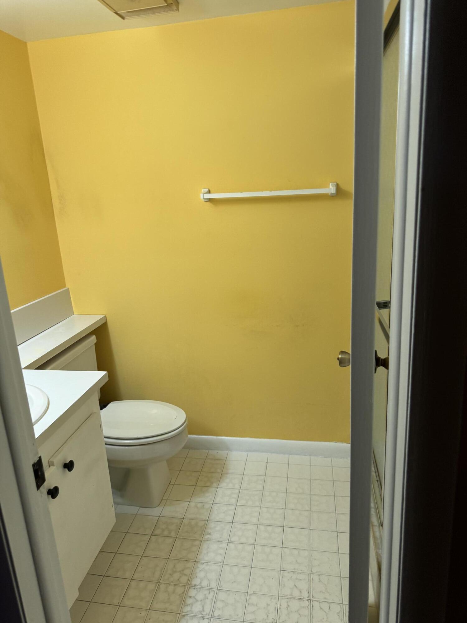 4101 Waterview Circle, Unit 41A Palm Springs, FL 33461 - Photo 26 of 26 a bathroom with a toilet