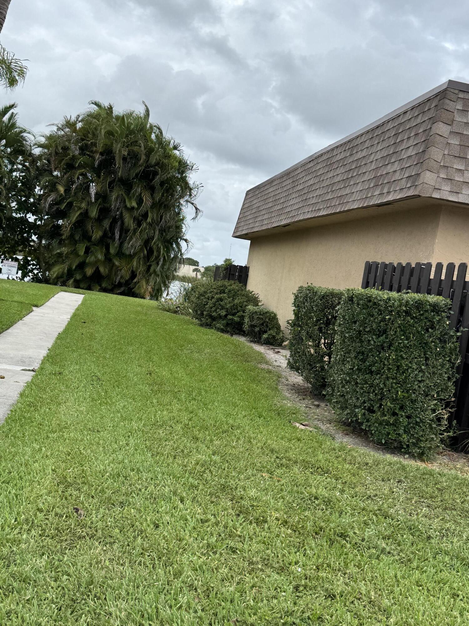 4101 Waterview Circle, Unit 41A Palm Springs, FL 33461 - Photo 5 of 26 a view of a backyard