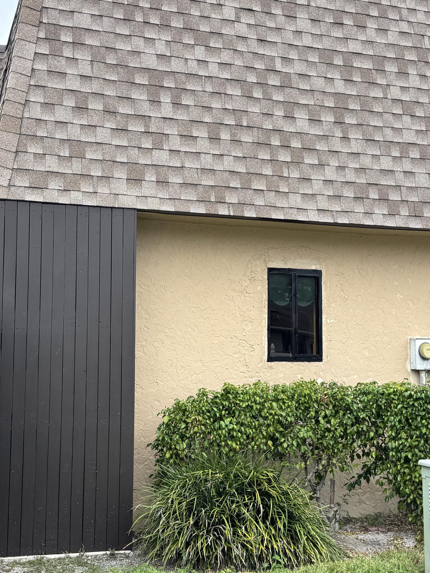 4101 Waterview Circle, Unit 41A Palm Springs, FL 33461 - Photo 6 of 26 a view of a backyard with plants