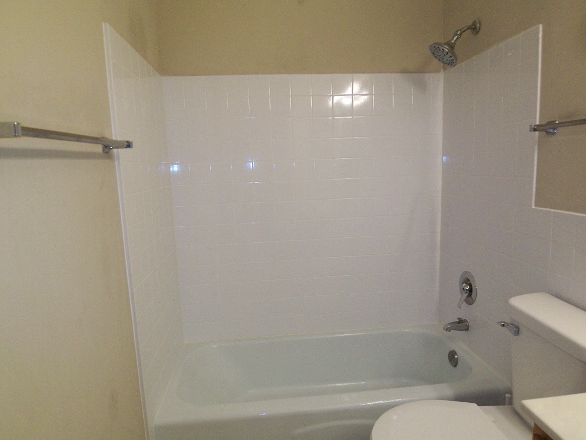 1227 South Old Wilke Road, Unit 306 Rolling Meadows, IL 60005 - Photo 15 of 24 a bathroom with a shower and toilet