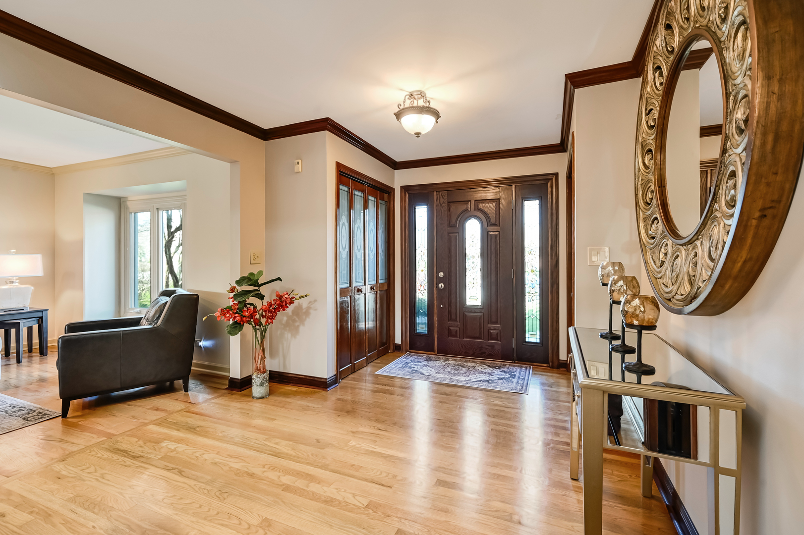 1435 Tomlin Drive Burr Ridge, IL 60527 - Photo 5 of 41 a view of a livingroom with furniture and a mirror
