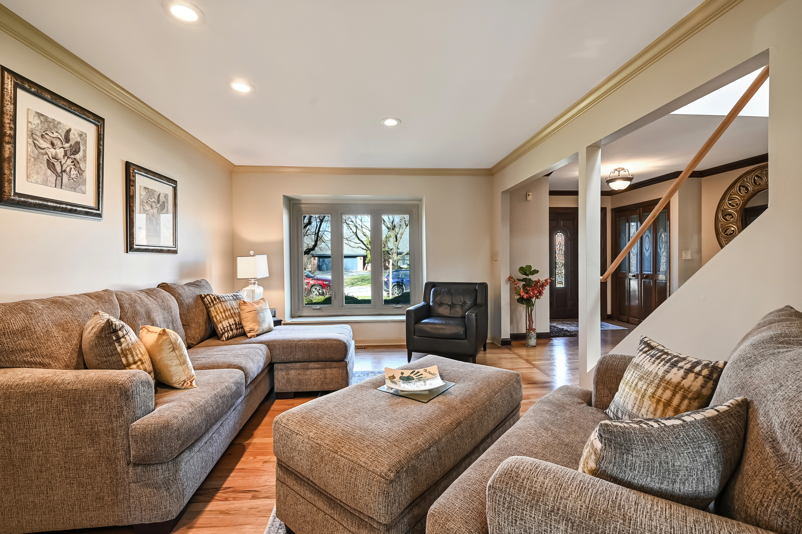 1435 Tomlin Drive Burr Ridge, IL 60527 - Photo 7 of 41 a living room with furniture and a window