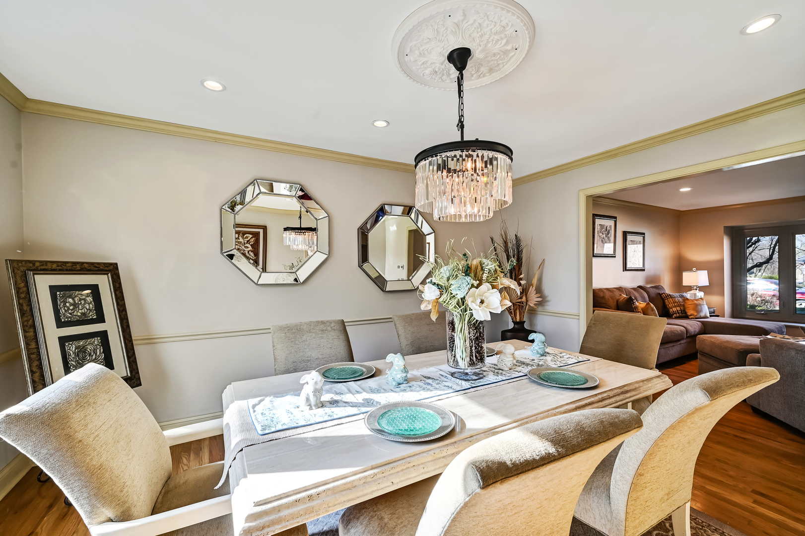 1435 Tomlin Drive Burr Ridge, IL 60527 - Photo 9 of 41 a view of a dining room with furniture a chandelier and wooden floor