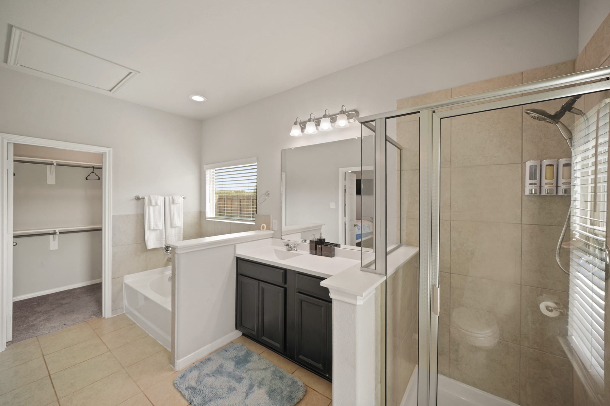 13303 Ardery Meadow Drive Houston, TX 77048 - Photo 19 of 33 a bathroom with a sink a toilet and a mirror
