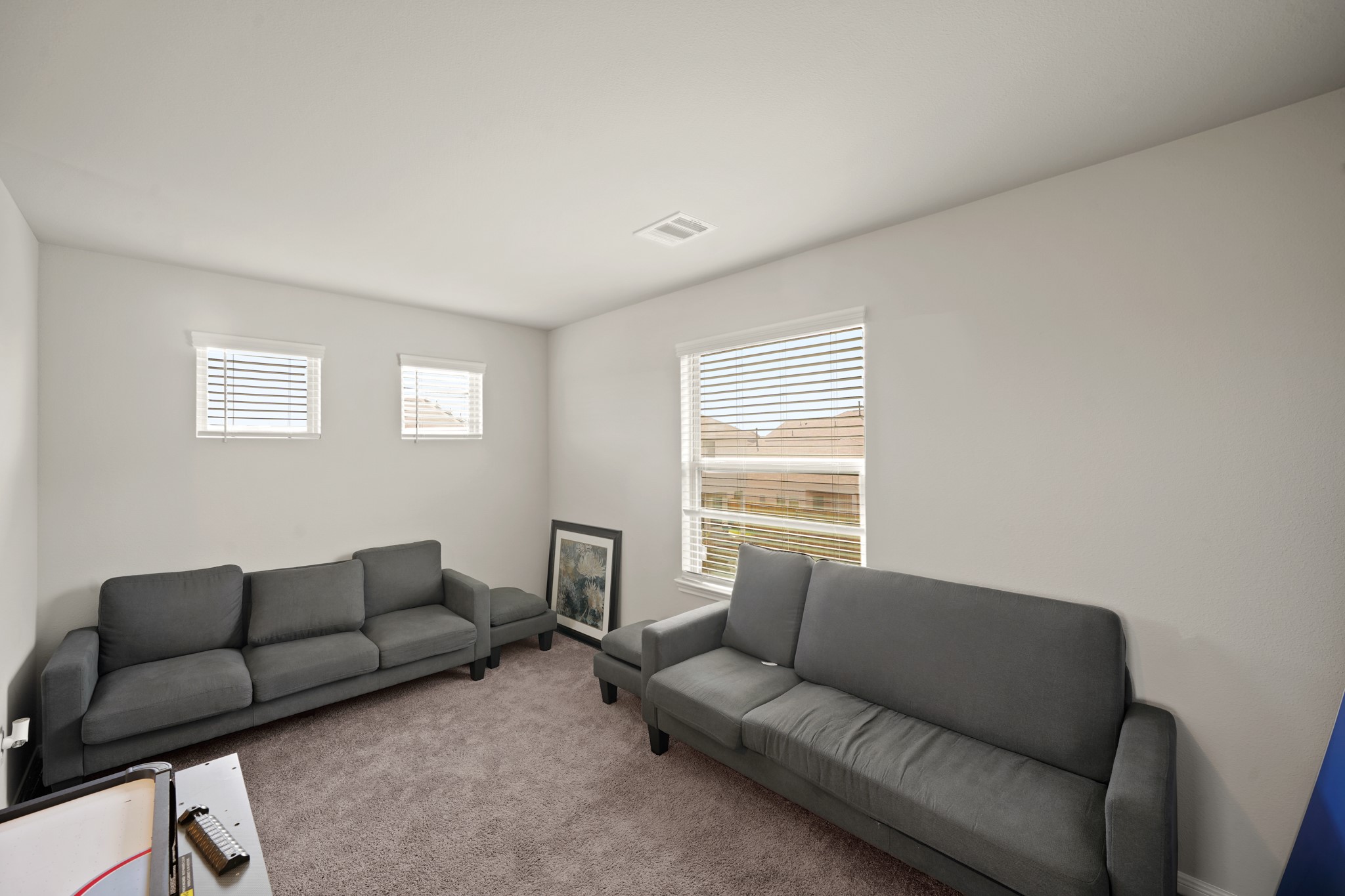 13303 Ardery Meadow Drive Houston, TX 77048 - Photo 22 of 33 a living room with furniture and a window