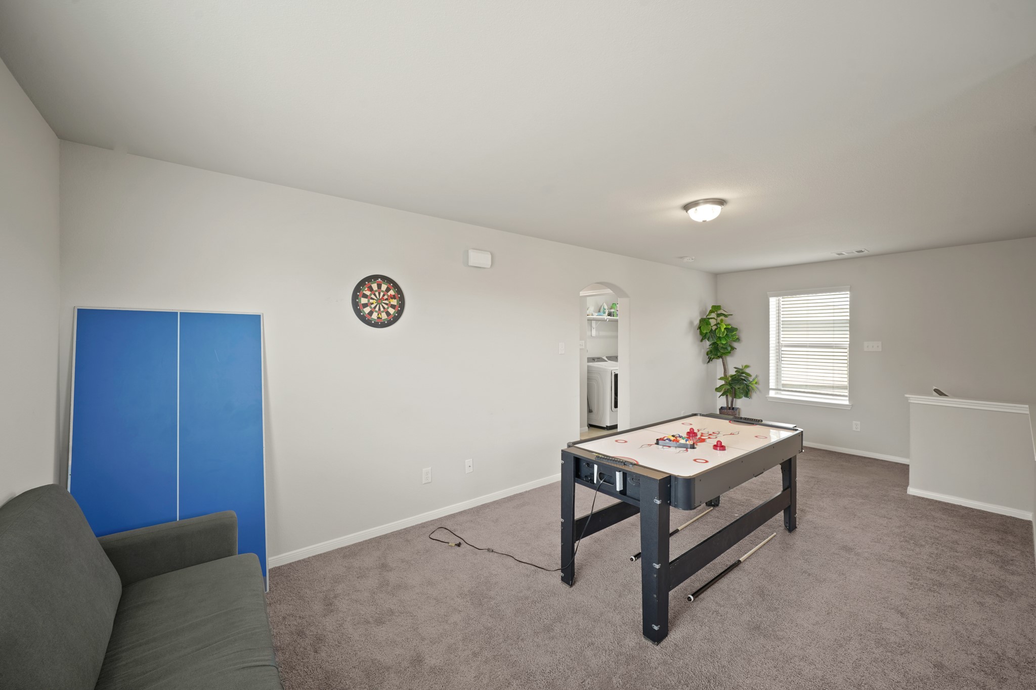 13303 Ardery Meadow Drive Houston, TX 77048 - Photo 23 of 33 a bed room with a bed and a table