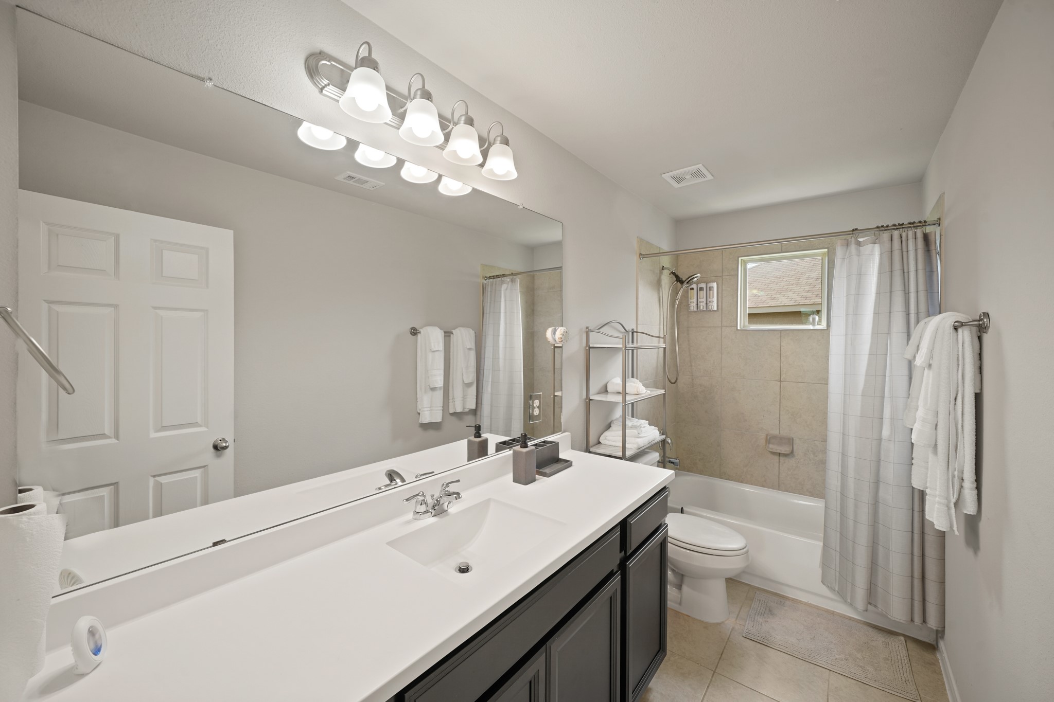 13303 Ardery Meadow Drive Houston, TX 77048 - Photo 25 of 33 a bathroom with a sink a toilet and shower