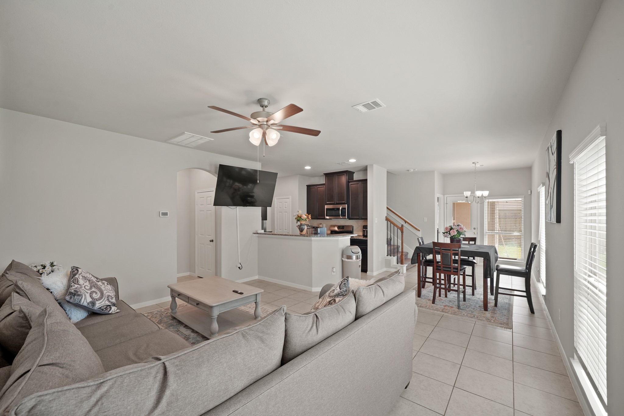 13303 Ardery Meadow Drive Houston, TX 77048 - Photo 4 of 33 a living room with furniture and kitchen view
