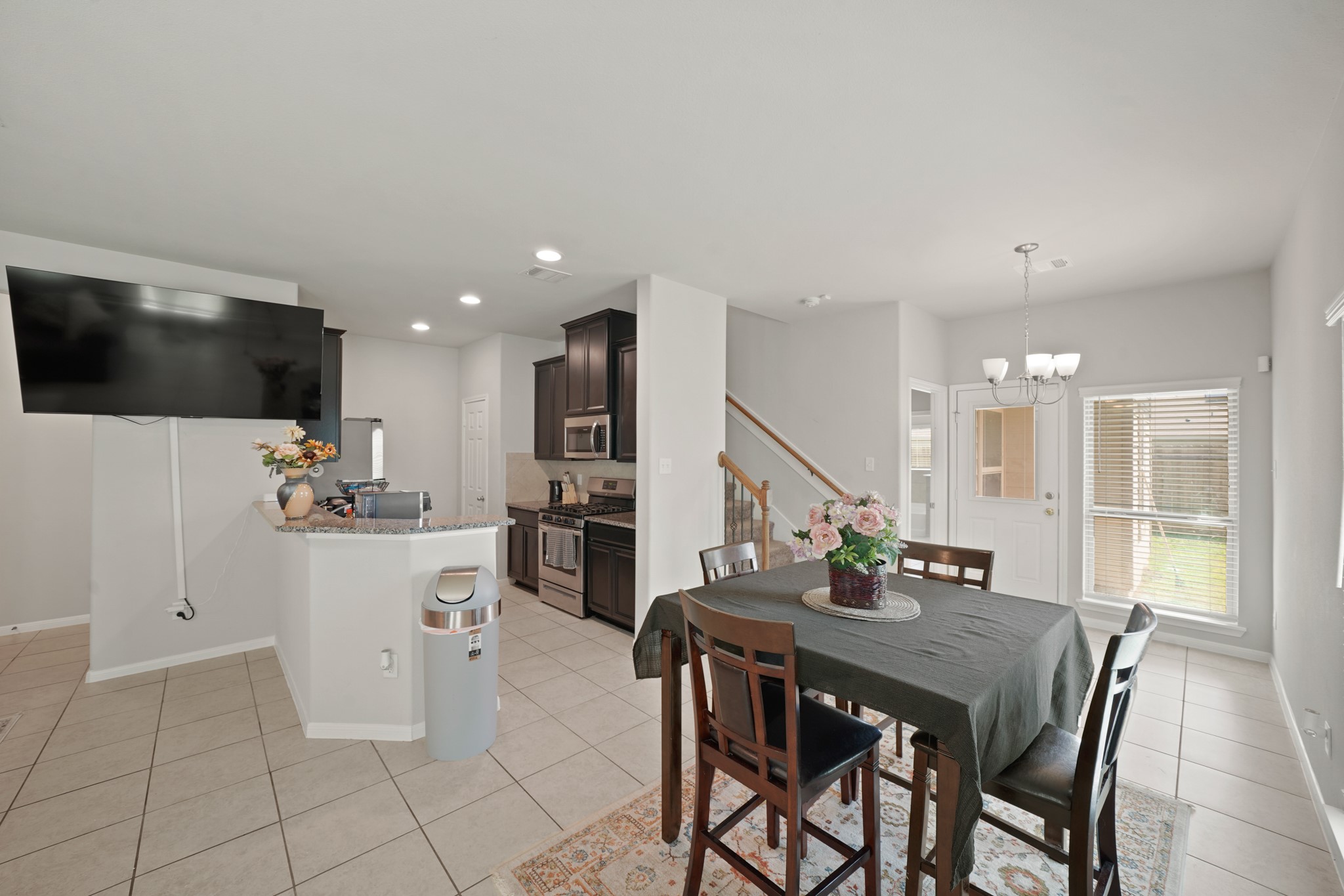 13303 Ardery Meadow Drive Houston, TX 77048 - Photo 6 of 33 a view of a dining room with furniture and wooden floor