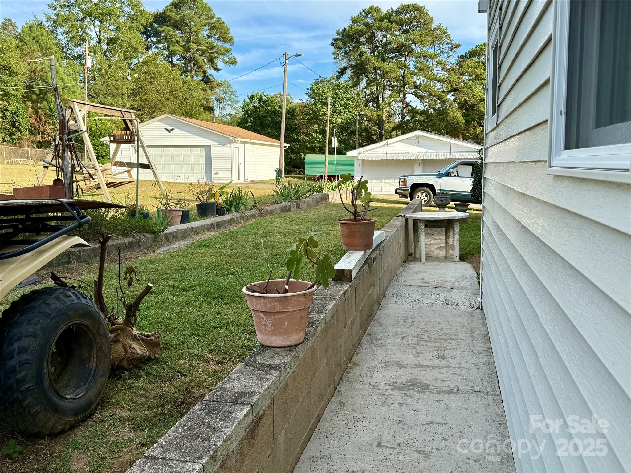103 Magnolia Avenue Great Falls, SC 29055 - Photo 19 of 22 a view of a house with backyard and sitting area