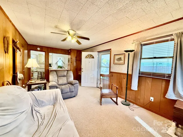 a bedroom with furniture and a window