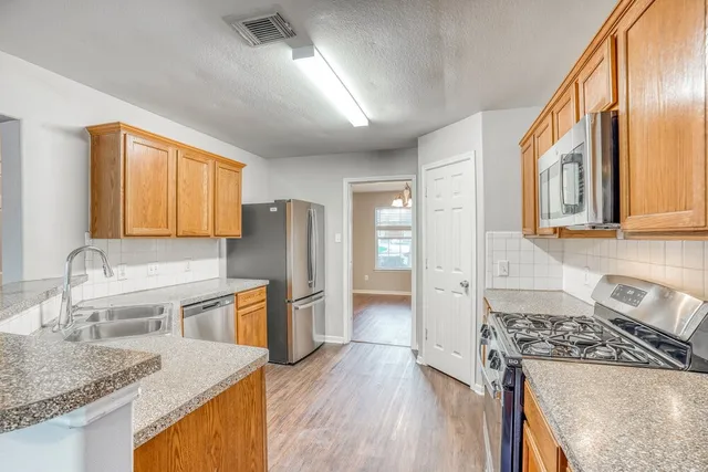 $1,995 | 9702 Winter Bloom Lane, Houston, TX 77088