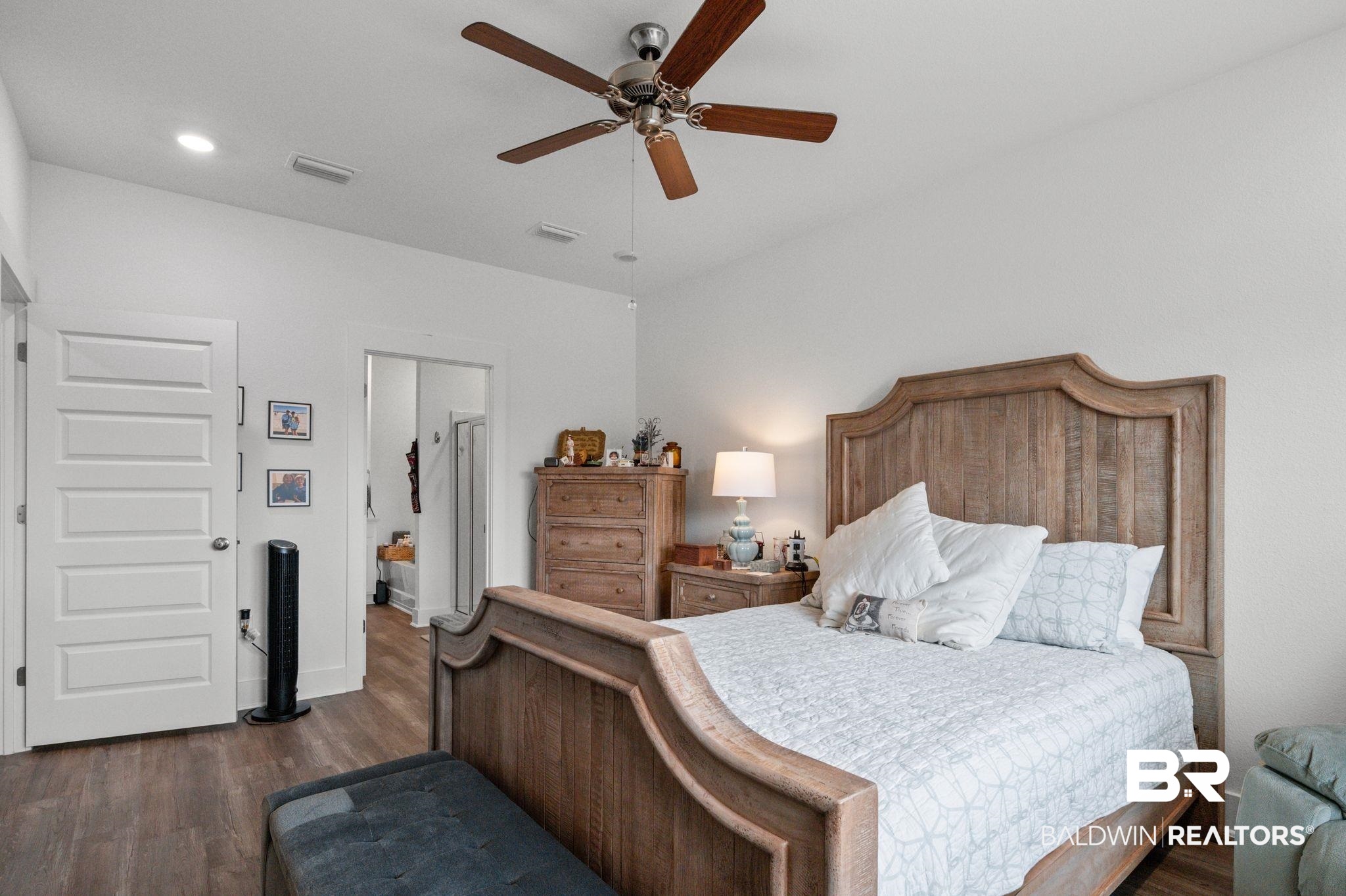 8508 Rosedown Lane Daphne, AL 36526 - Photo 18 of 29 Bedroom featuring dark wood-style floors and a ceiling fan