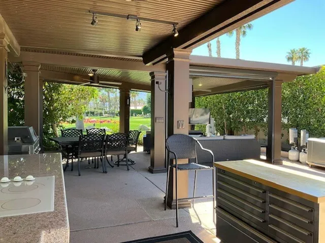 a outdoor space with chairs and couch