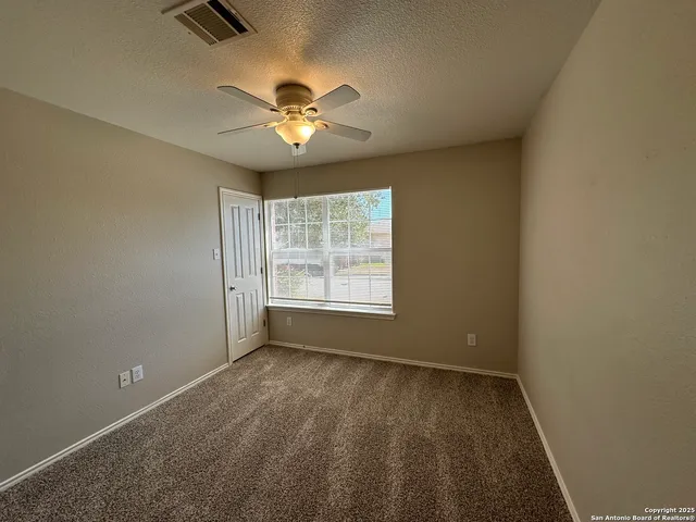 a house with trees in front of it