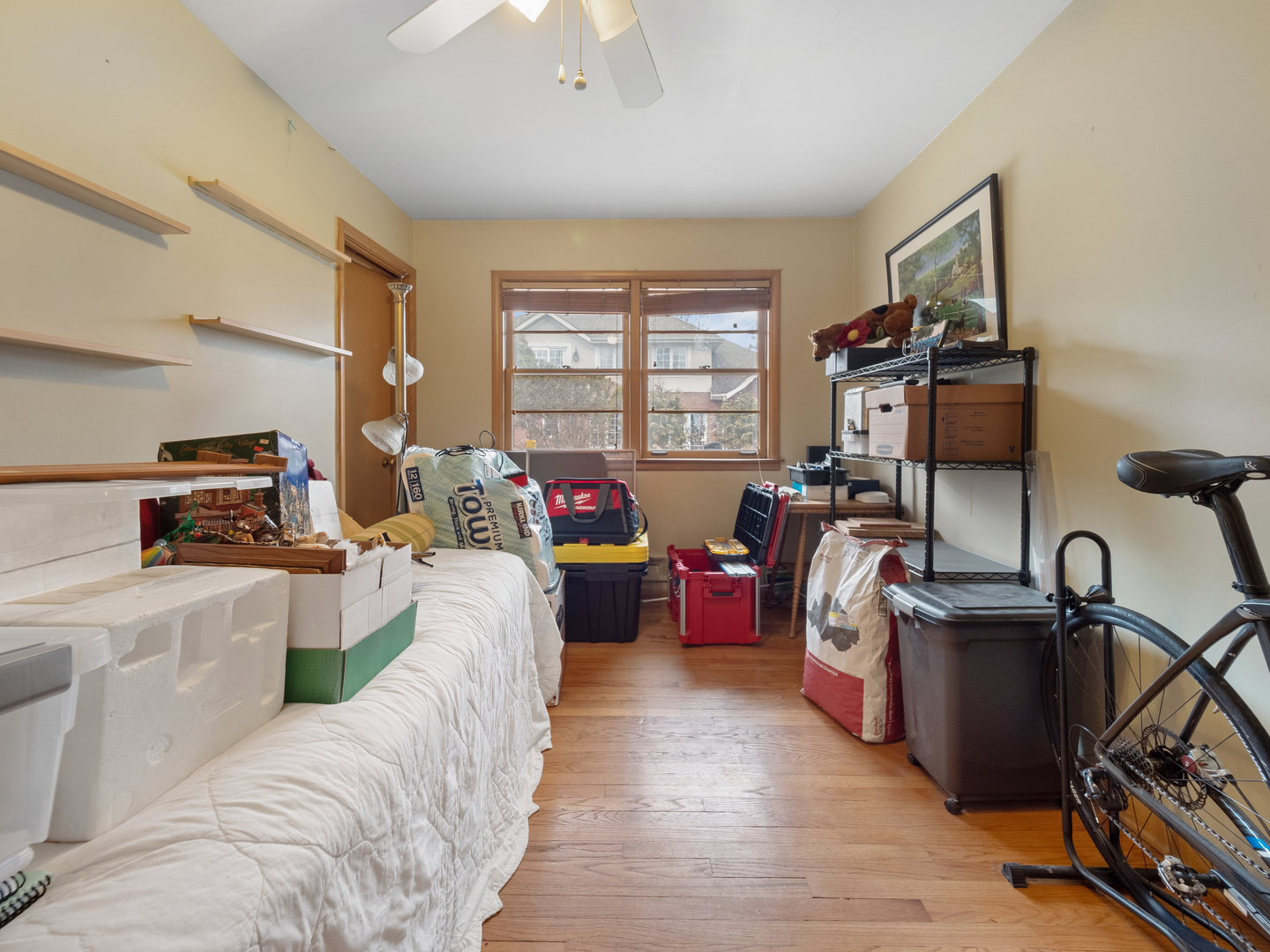 224 East Lahon Street Park Ridge, IL 60068 - Photo 14 of 25 a living room with furniture a window and gym equipment