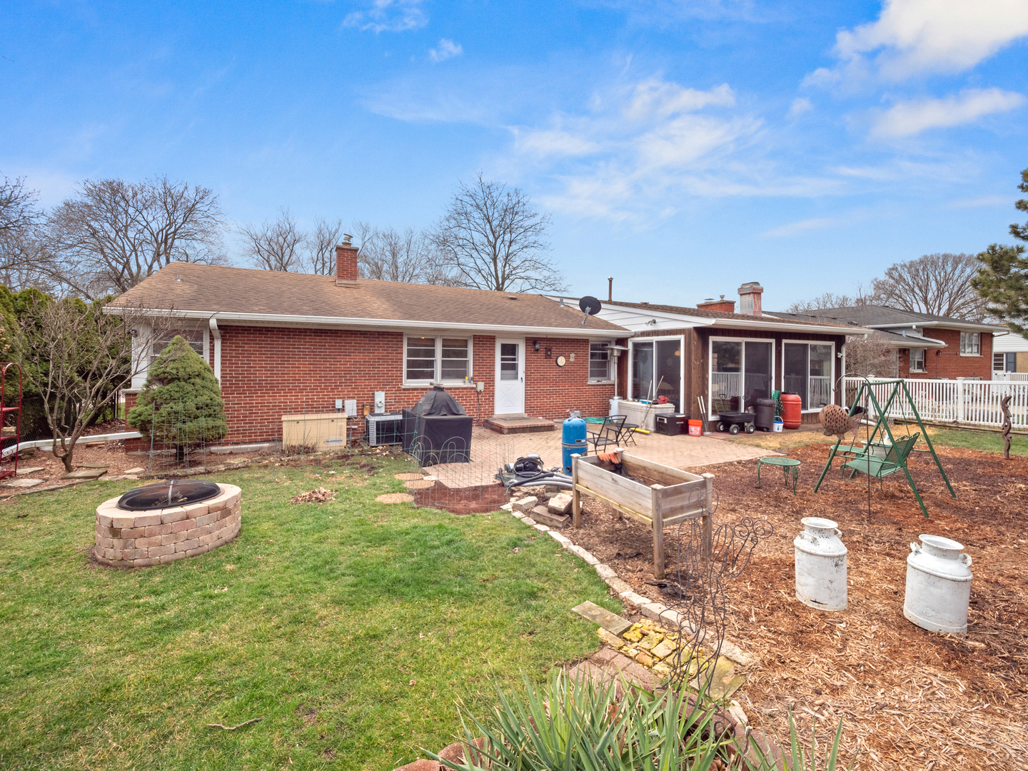 224 East Lahon Street Park Ridge, IL 60068 - Photo 21 of 25 a view of a house with swimming pool and sitting area