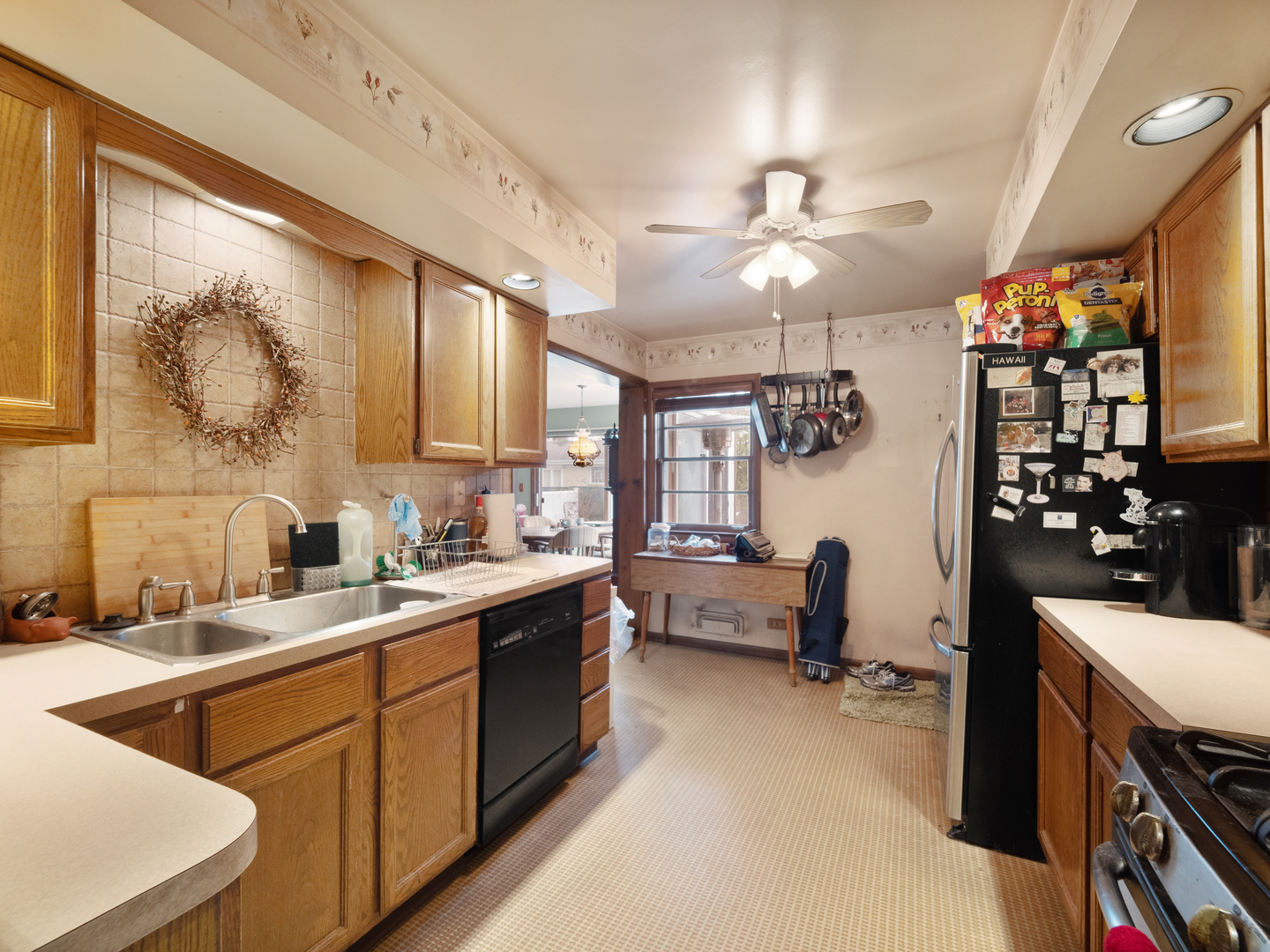 224 East Lahon Street Park Ridge, IL 60068 - Photo 8 of 25 a kitchen with a sink appliances and cabinets