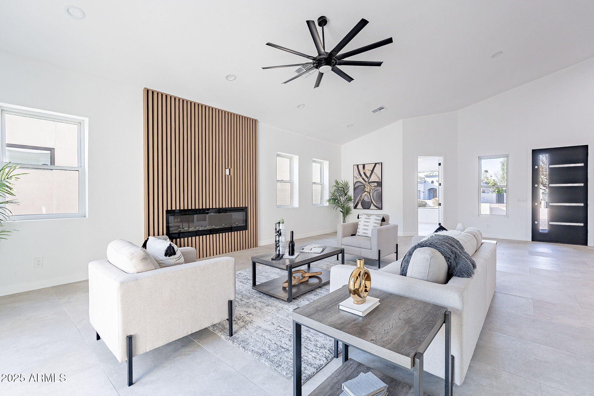 707 East Ocotillo Road Phoenix, AZ 85014 - Photo 15 of 59 a living room with furniture and a large window