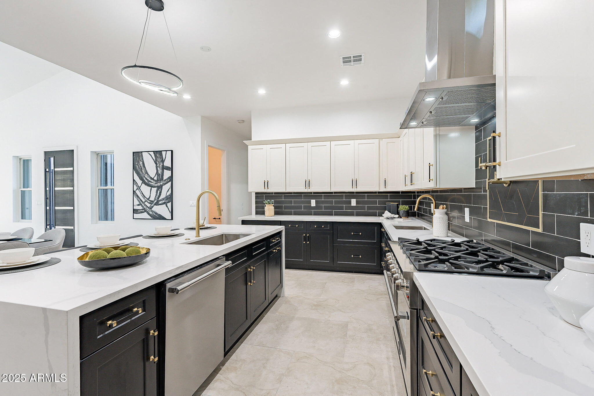 707 East Ocotillo Road Phoenix, AZ 85014 - Photo 23 of 59 a kitchen with a sink stove and cabinets