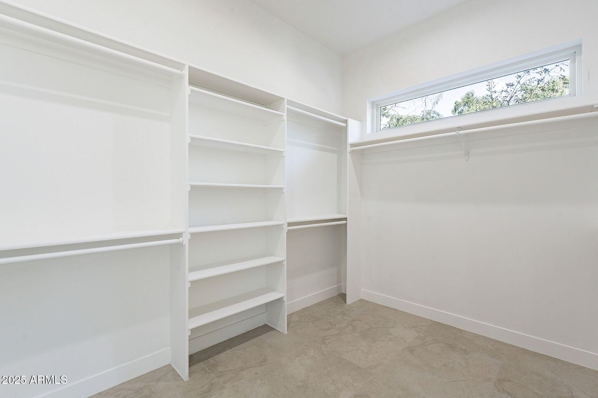 707 East Ocotillo Road Phoenix, AZ 85014 - Photo 33 of 59 a view of an empty walk in closet