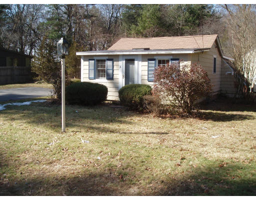 31 Evergreen Road Norton, MA 02766 - Photo 1 of 1 a view of a house with backyard and garden