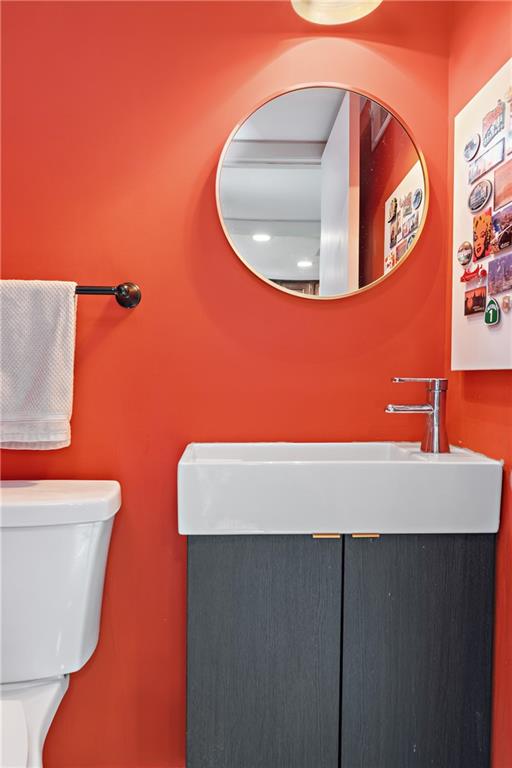 7 Foster Square Pittsburgh, PA 15212 - Photo 12 of 22 a bathroom with a sink and a mirror